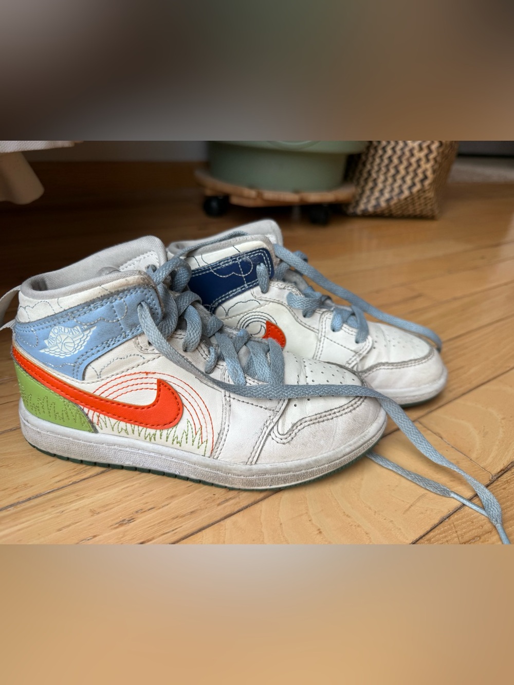 Kids Nike High-Top Sneakers in White with Orange and Blue Accents